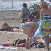 Bikini girls setting up for a day on the beach in their bikinis MKini_0046.JPG