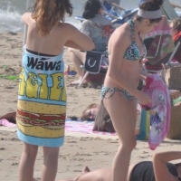 Bikini girls setting up for a day on the beach in their bikinis MKini_0052.JPG