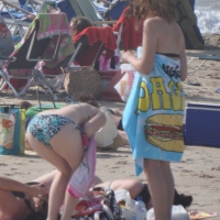 Bikini girls setting up for a day on the beach in their bikinis MKini_0048.JPG