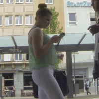 Candid blonde in tight white jeans