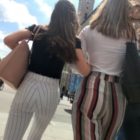 2 friends in tight pants