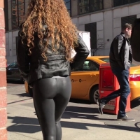 Sofie Dossi in leather leggings