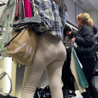 Latina in grey leggings