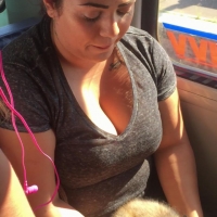 Blowing on her tits or dog?