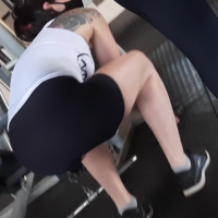 Tattooed Brazilian milf in the gym