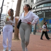 Asian in grey leggings