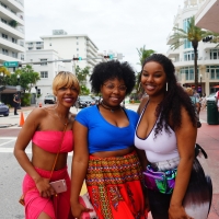 Three ebony babes posing