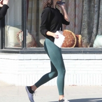 Eiza Gonzalez at a cafe in leggings