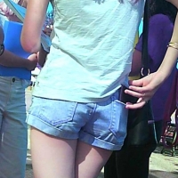 Skinny girl in jean shorts