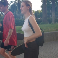 Braless skateboarder