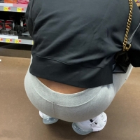 Ebony milf squatting