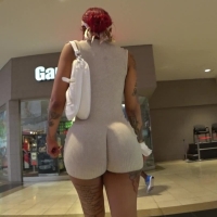 Tattooed red haired ebony