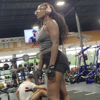 Nerdy ebony gym babe