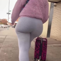 Latina in grey leggings