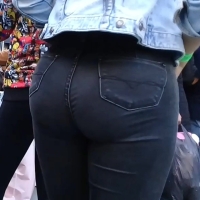 Latina in black jeans