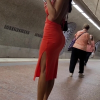 Latina in orange dress