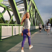 Blonde in purple leggings