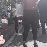 Latina in black leggings