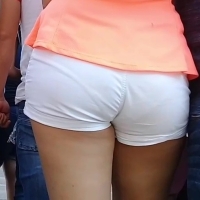 Latina in white shorts
