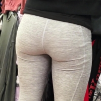 Ebony ass in grey