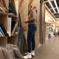 Blonde milf measuring wood