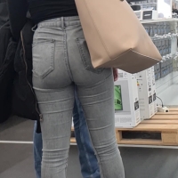 Brunette in grey jeans