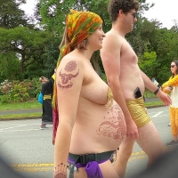 Topless pregnant babe