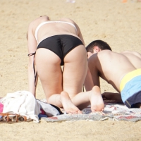 Bent over beach girl