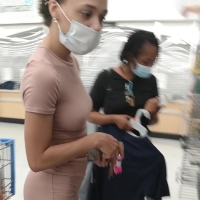 Braless black babe
