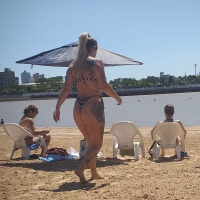 Tattooed big booty beach babe