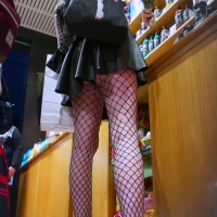 Ass cheeks in fishnet stockings