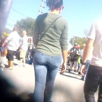 Brunette in tight jeans
