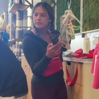 Pigtailed Lulu employee