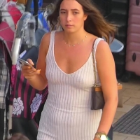 Braless brunette