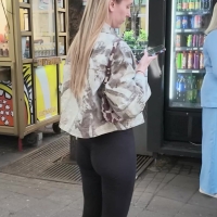 Blonde in black leggings