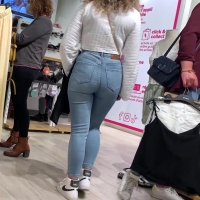 Curly haired babe with a booty