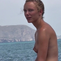 Pretty topless beach blonde