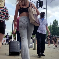 Skinny girl in grey leggings