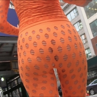 Orange body suit Latina