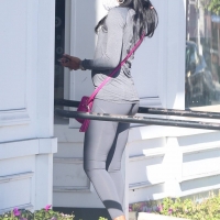 Lori Harvey in grey leggings