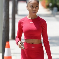 Skai Jackson in red leggings