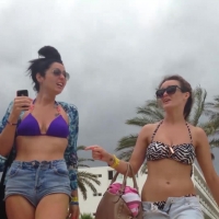 Two sexy friends in bikini tops