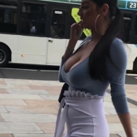 Brunette with huge boobs