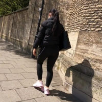 Brunette in black leggings