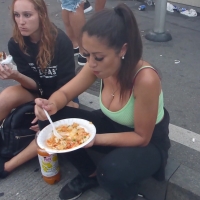 Busty girl eating Stodge