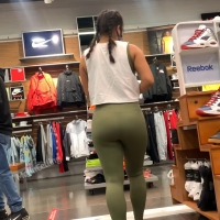 Asian in green leggings