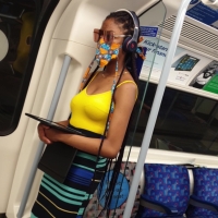 Black girl in yellow top