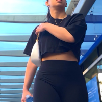 Nerdy brunette in leggings