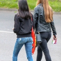 Two teens in jeans