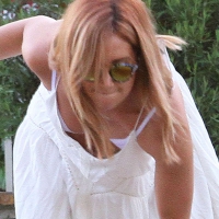 Ashley Tisdale walking her dog in Beverly Hills